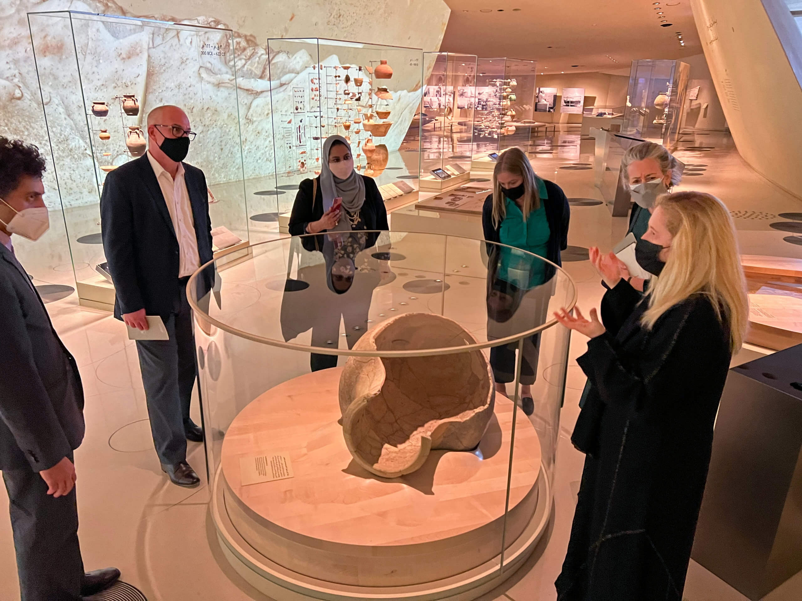 The delegates learning about the rich history and traditions of Qatar at the National Museum of Qatar